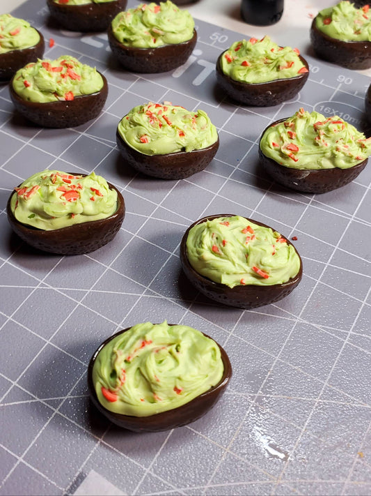 1:6 scale guacamole doll food by Chef Gina's Mini Food, miniature avocado halves with green guacamole and red seasoning