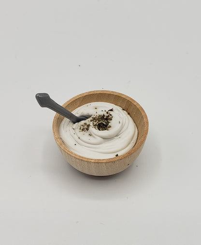 Wooden bowl of mashed potatos