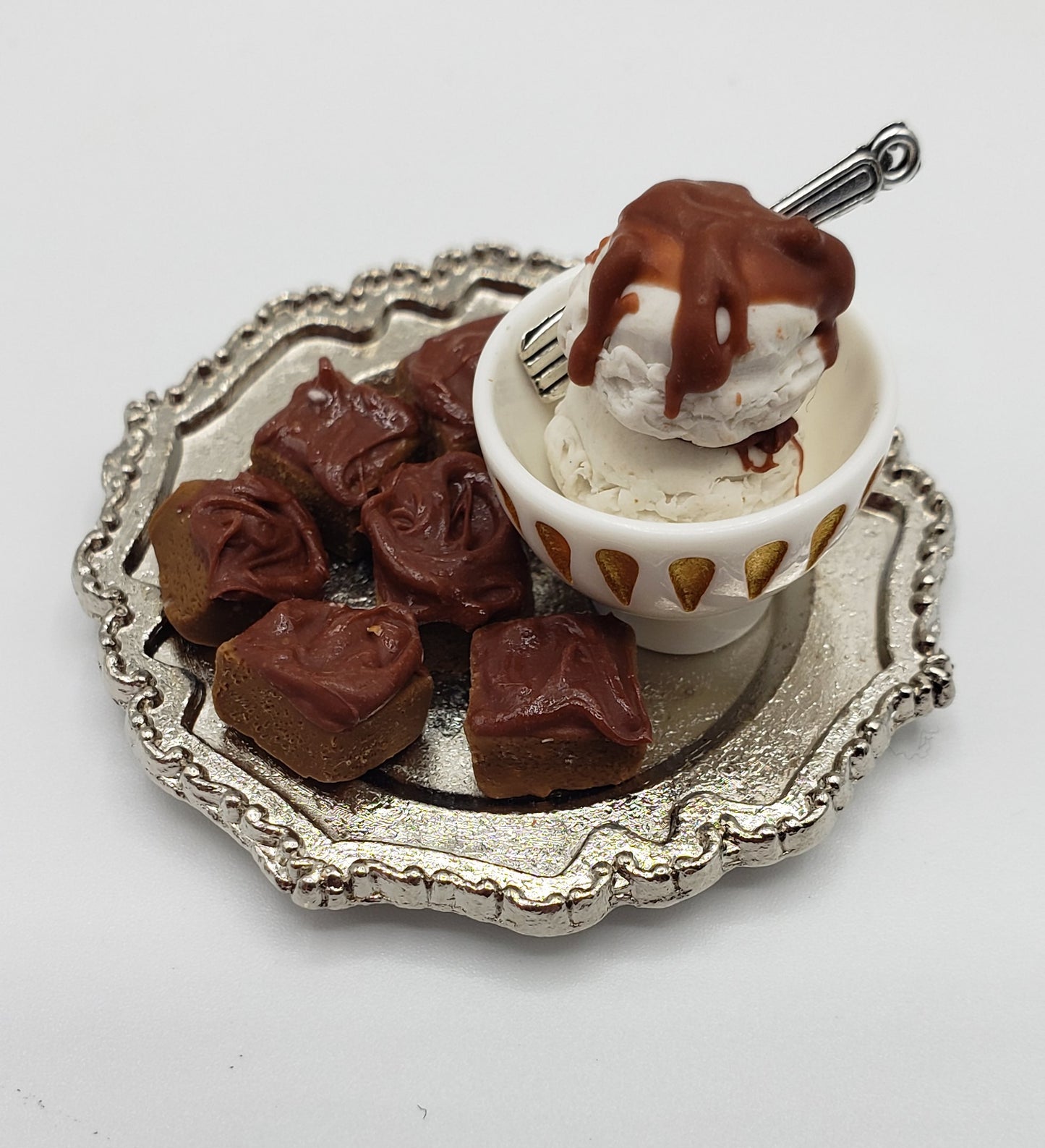 Chef Gina's miniature brownies for dolls served on a silver tray with ice cream and chocolate sauce