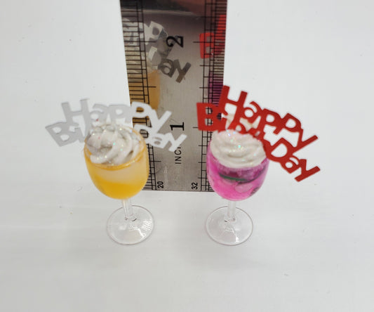 Chef Ginas miniature happy birthday cocktail drinks in yellow and pink with whipped cream and decorative toppers