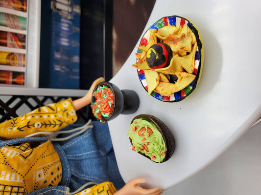 Chef Gina's miniature salsa for dolls served with chips and guacamole in a doll kitchen setting