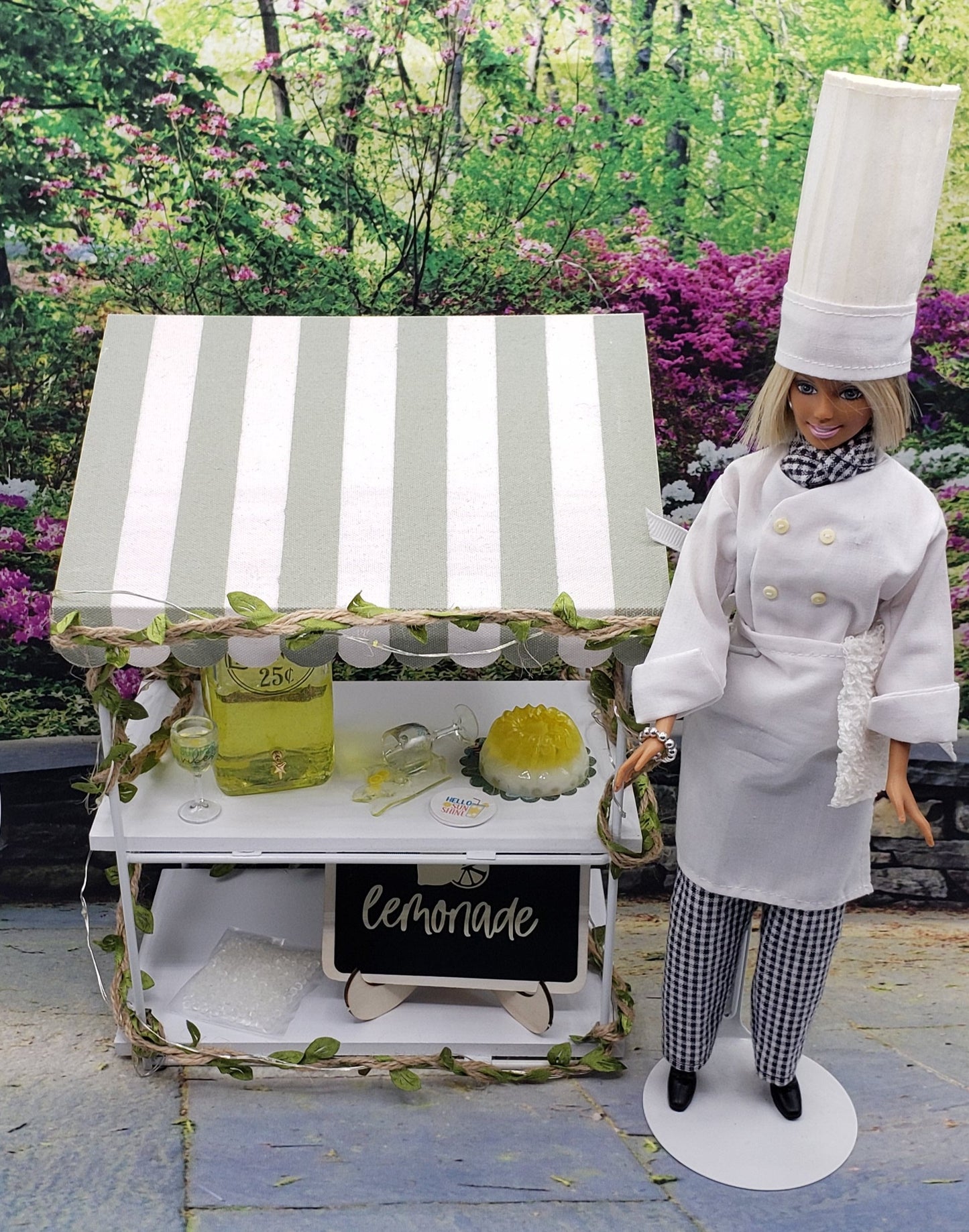 Chef Gina's Summer Vibes doll lemonade set featuring a chef doll and striped lemonade stand
