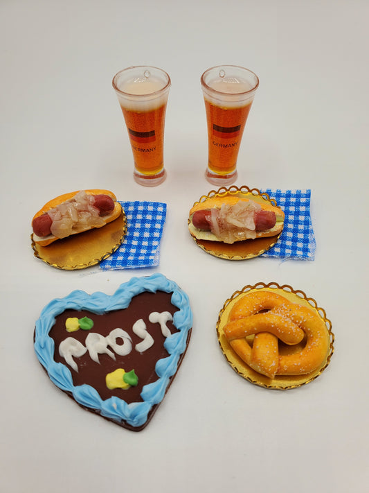 1:6 scale Oktoberfest doll food set with two beers, two hot dogs, a heart-shaped cookie, and pretzels by Chef Gina's Mini Food