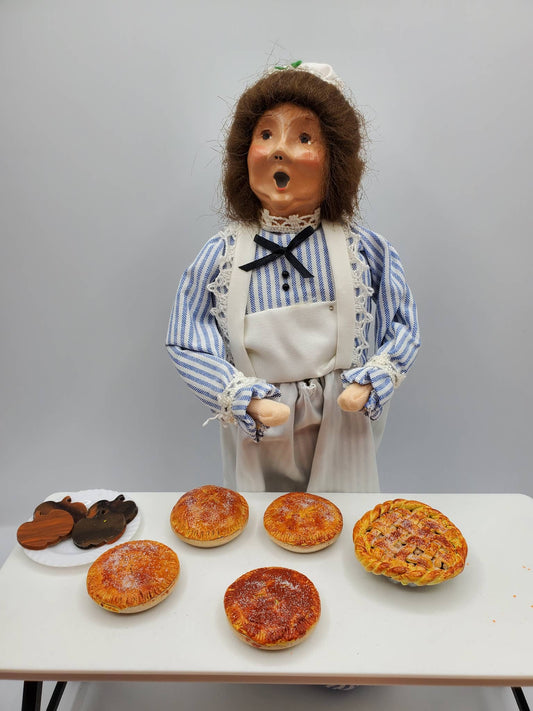 Chef Gina's Mini Food Doll with baked goods display on table, featuring mini pies and cookies