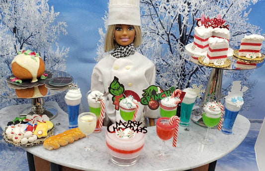Chef Gina's miniature candy cane drink and other festive holiday mini desserts on table with chef doll