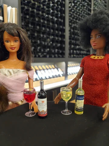Barbie drinking wine