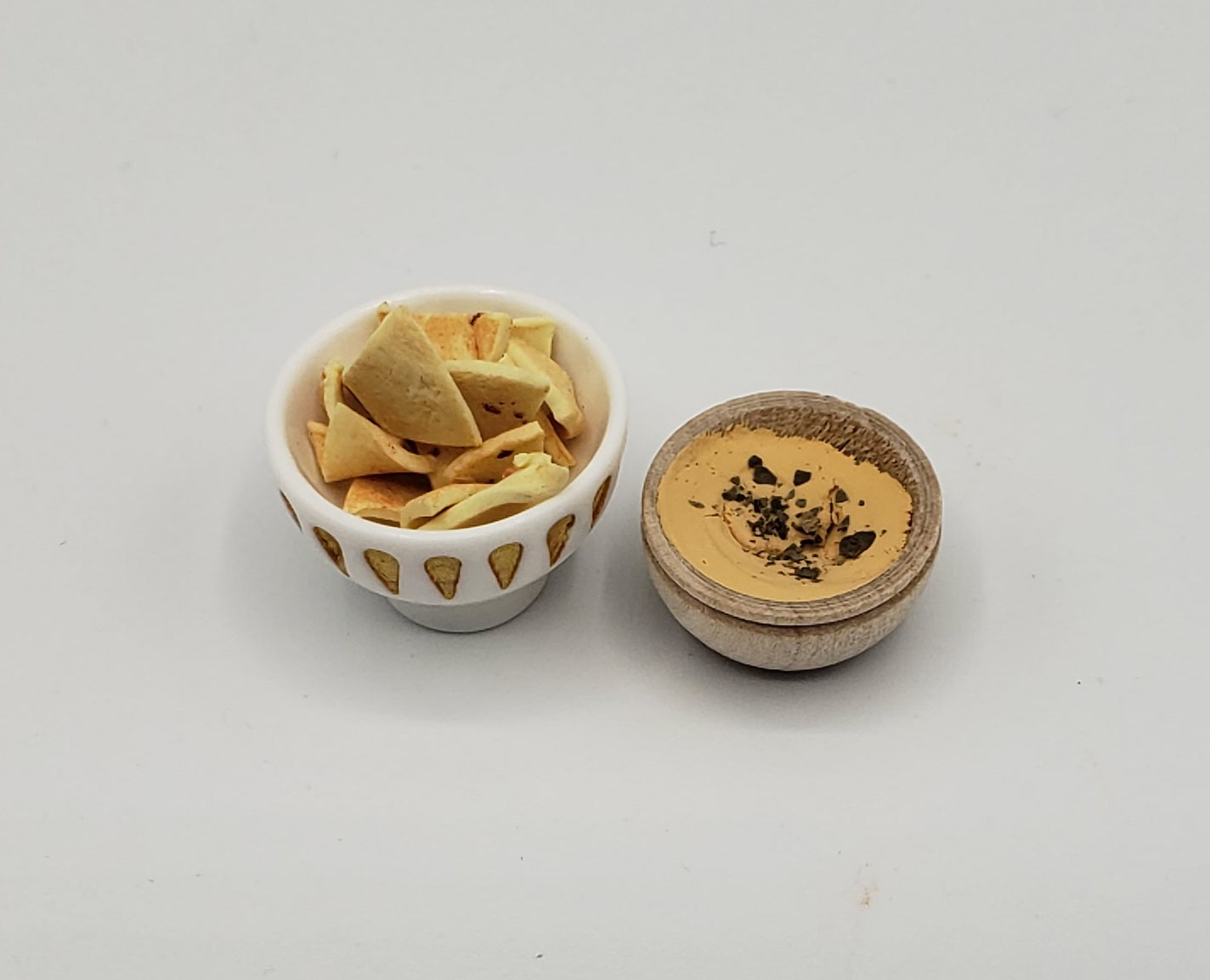 small tortilla chips with hummus for barbie dolls