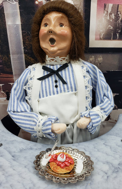 Byers' choice doll with waffle