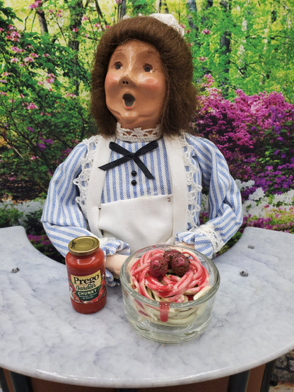 Byers choice doll with spaghetti and plastic prego jar