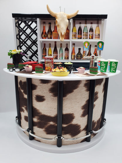 Country western bar set for dolls with cowhide design, miniature drinks, snacks, and decorative skull