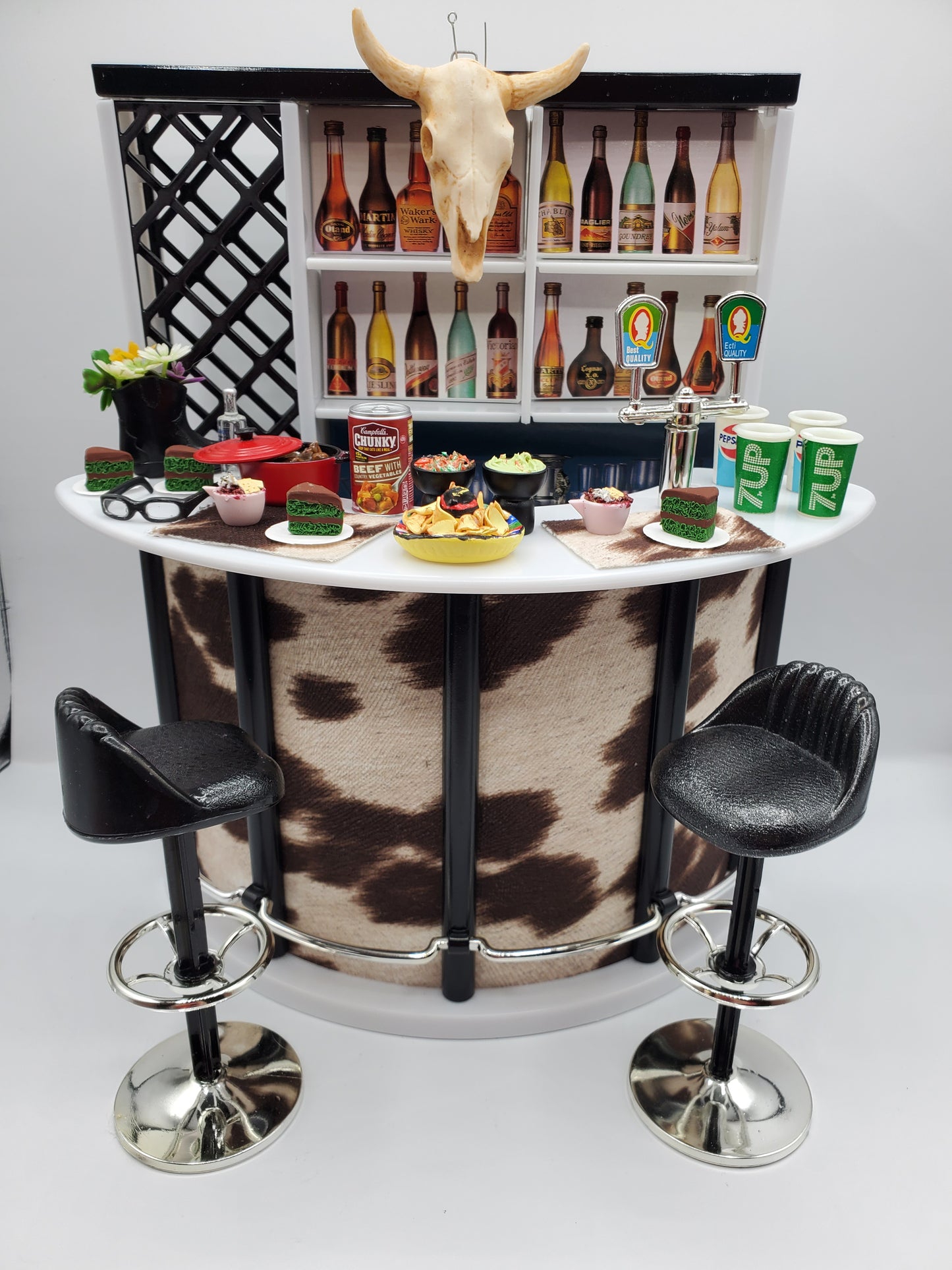 Chef Gina's country western bar set for dolls featuring cowhide bar, two stools, miniature drinks, and food accessories