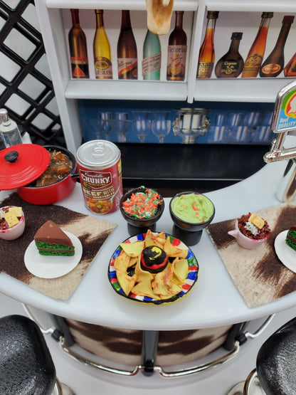 Chef Gina's country western bar set for dolls with miniature snacks and drinks on bar counter