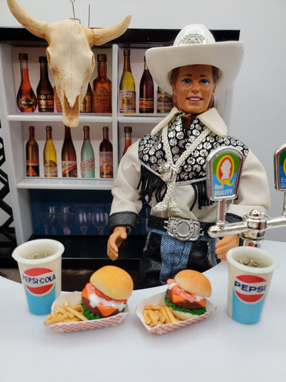 Miniature bison burgers for dolls with fries and Pepsi cups in a doll cowboy bar setting