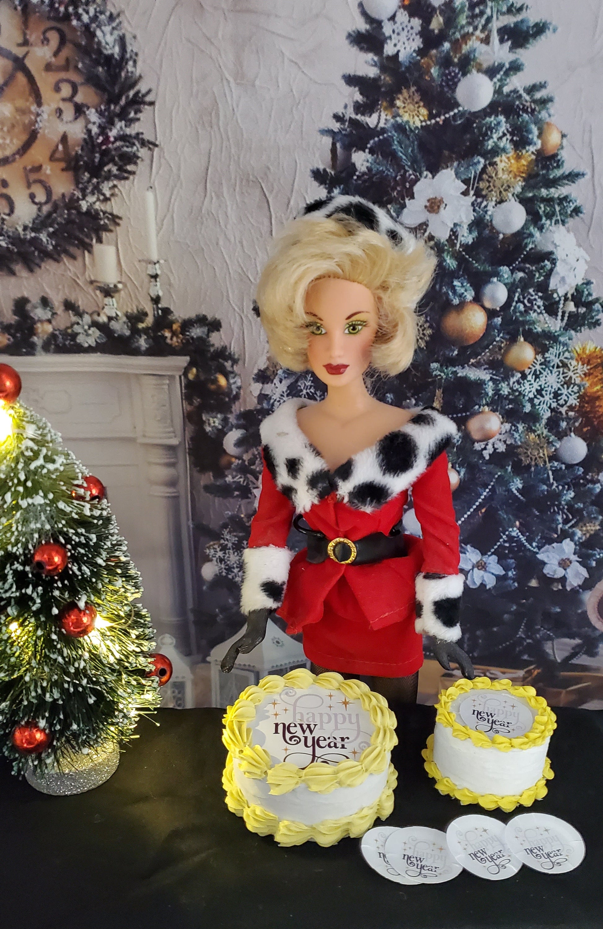 Decorative figure with a festive outfit and New Year's decorations in a Christmas-themed setting.