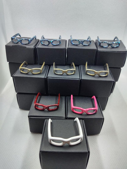 Set 1 Barbie eyeglasses with black boxes