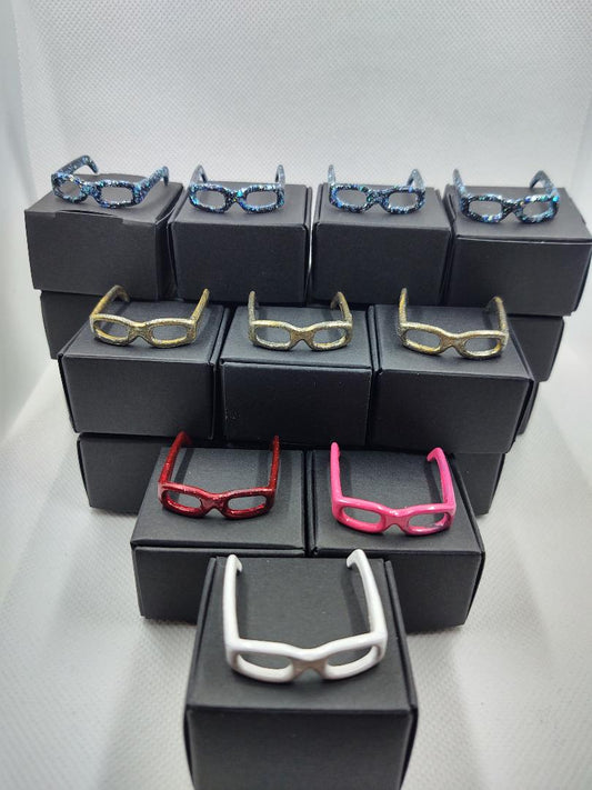 Set 1 Barbie eyeglasses with black boxes