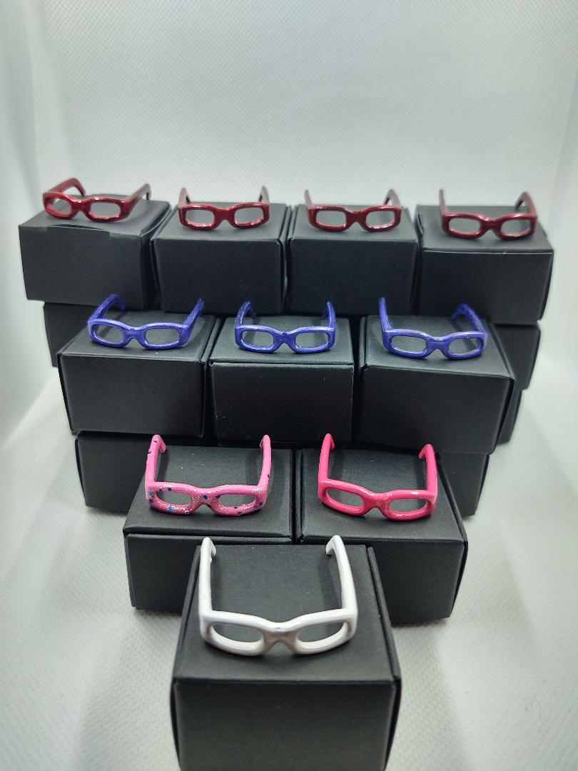 Set 2 Barbie eyeglasses with black boxes