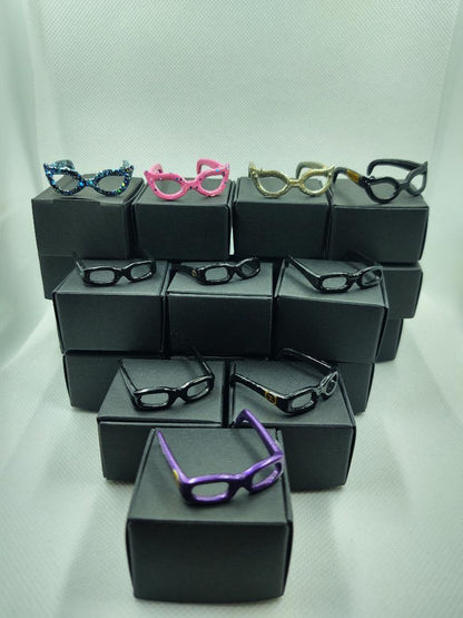 set 5 Barbie eyeglasses with black boxes
