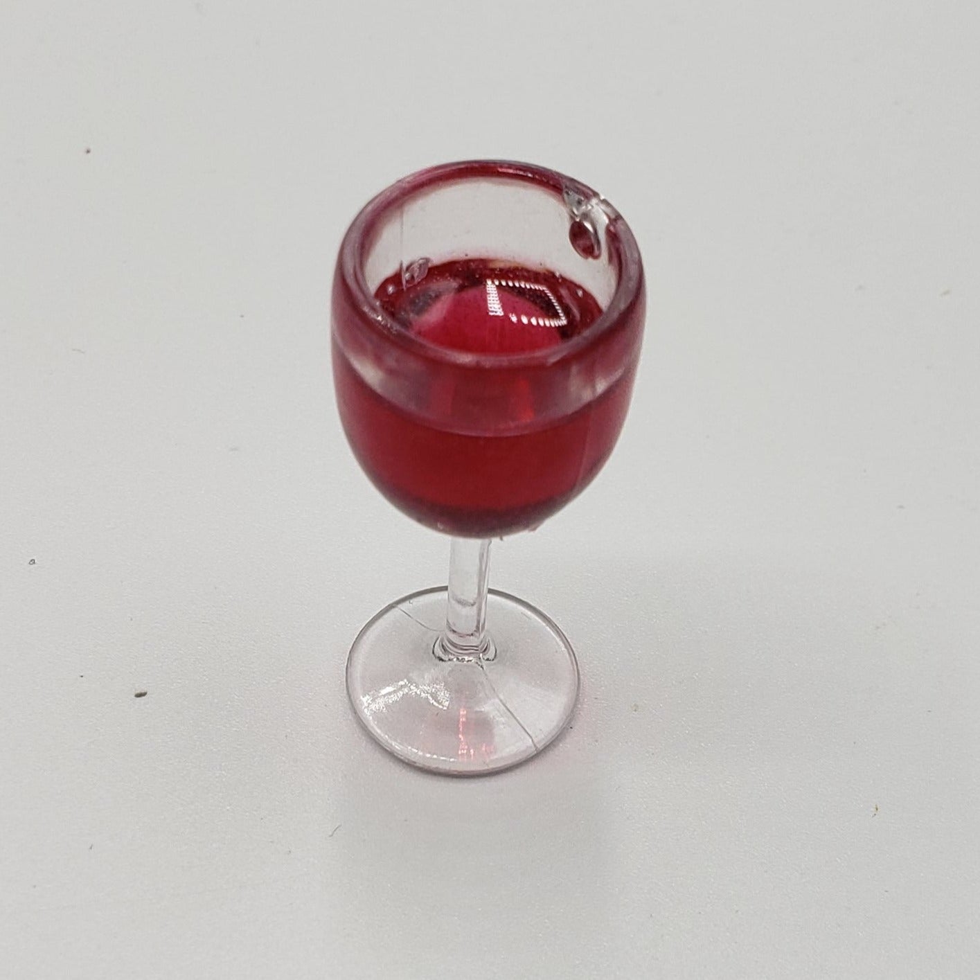 top of red wine glass