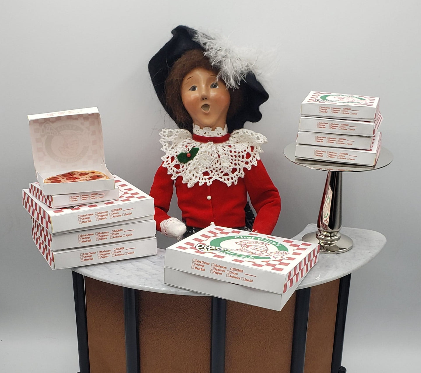 byers' choice doll with pizza