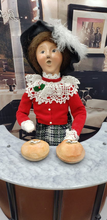 Byers choice doll with a pie